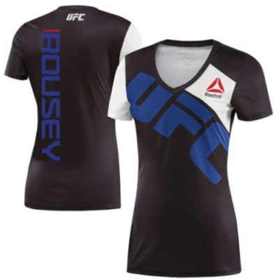 Camiseta deportiva para mujer UFC Rowdy Ronda Rousey Reebok cuello en V negra azul tiza AI0661 NTW Foto 1 de 3