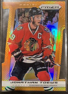 2013-14 Panini Prizm Prizms Orange Die Cut 49/50 Jonathan Toews