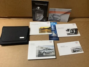 2008 Audi Q7 owner's manual with black case. - Picture 1 of 13