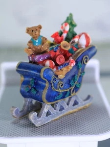 Trineo de Navidad en miniatura lleno de juguetes y regalos trineo azul pueblo de vacaciones - Imagen 1 de 13
