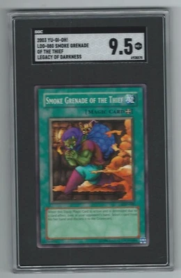 2004 YU-GI-OH! Legacy of Darkness Smoke Grenade of The Thief Graded SGC 9.5 pop1 - Image 1 of 2