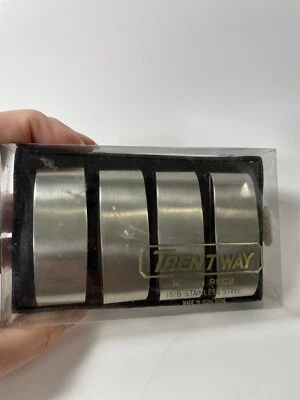 Juego de 4 servilleteros vintage de acero inoxidable MCM oblongos Reino Unido Timothy Whites nuevos Foto 1 de 4