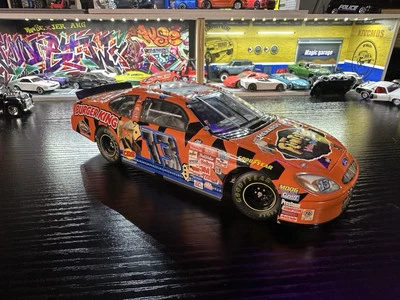 Coche de carreras Robby Gordon Burger King Flintstones Ford Taurus Nascar 2000 escala 1:24 Foto 1 de 4