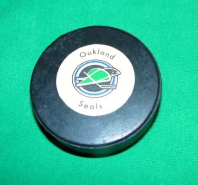 DISCO DE HOCKEY RAWLINGS VINTAGE OAKLAND SEALS EXCELENTE ESTADO LOGOTIPOS DE GOMA, CANADÁ Foto 1 de 4