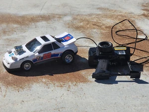 New Bright 1990 RC Pontiac mit Kabelfernbedienung Vintage Radio Control - Bild 1 von 10