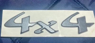 OEM новый задний люк эмблема табличка 4 x 4 металлический 1997-2002 Kia Sportage - Изображение 1 из 3