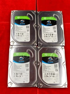 4 x SEAGATE SKYHAWK SURVEILLANCE 3.5" SATA 1TB HARD DRIVE 5900RPM ST1000VX005 - Picture 1 of 5