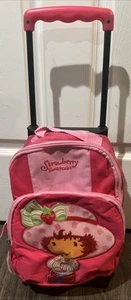 VINTAGE STRAWBERRY SHORTCAKE Kinder rosa kleiner Rollkoffer/Rucksack 13”x 8” - Bild 1 von 8