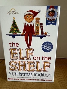 The Elf On The Shelf A Christmas Tradition Brown Eyed Boy Dark Elf with Book NIB - Picture 1 of 9