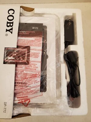 COBY 7" DP772 DIGITAL WIDESCREEN PHOTO FRAME / MP3 PLAYER - NEW/OPEN BOX - Image 1 of 4