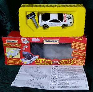 MATCHBOX SL-210 ALARM CARS FERRARI F40 SUPERKINGS SCALA 1:43 MADE CINA 1993 NIB - Foto 1 di 8