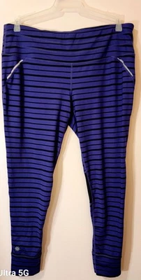 Pantalón de yoga reflectante Athleta Relay talla XLarge púrpura con bolsillos a rayas negras Foto 1 de 4