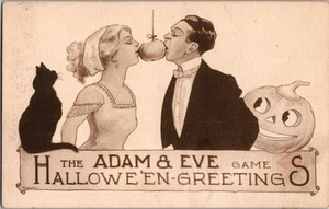 Raro Antiguo TARJETA POSTAL DE HALLOWEEN PAREJA JUGANDO JUEGO "ADÁN + EVA" Gibson JO5 - Imagen 1 de 2