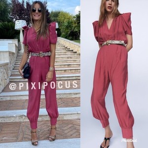 pink belted jumpsuit
