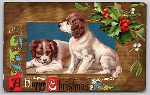 Postcard Art  Happy Christmas Two Spaniel Puppies Framed Holly c1908 6Z - Picture 1 of 2