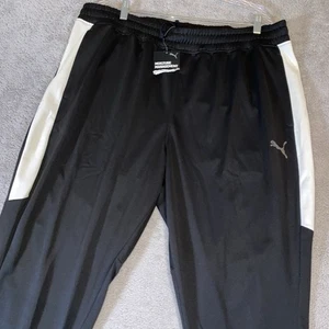 Pantalones deportivos Puma XXL negros blancos absorbentes de humedad elásticos cónicos nuevos con etiquetas - Imagen 1 de 13