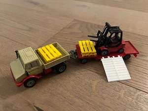 Siku 2522 Unimog 1620 Beige U1500 mit Linde H30 Gabelstapler 1:55 - Bild 1 von 1