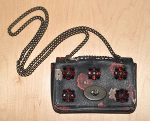 Bolso sin asas COACH raro bandolera con cadena tachonada floral negro elegante - Imagen 1 de 12