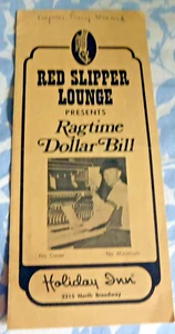 Vintage Red Slipper Lounge of Holiday Inn N Denver Brochure Ragtime Dollar Bill - Picture 1 of 3