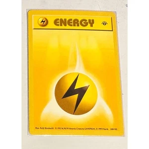 1st Edition Base Set Lightning Energy 100/102 1999 Pokémon First one *UNPLAYED * - Picture 1 of 2