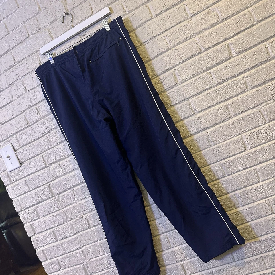 Pantalones de chándal vintage Nike años 90 Y2K azul marino blanco a rayas talla pequeña Foto 1 de 3