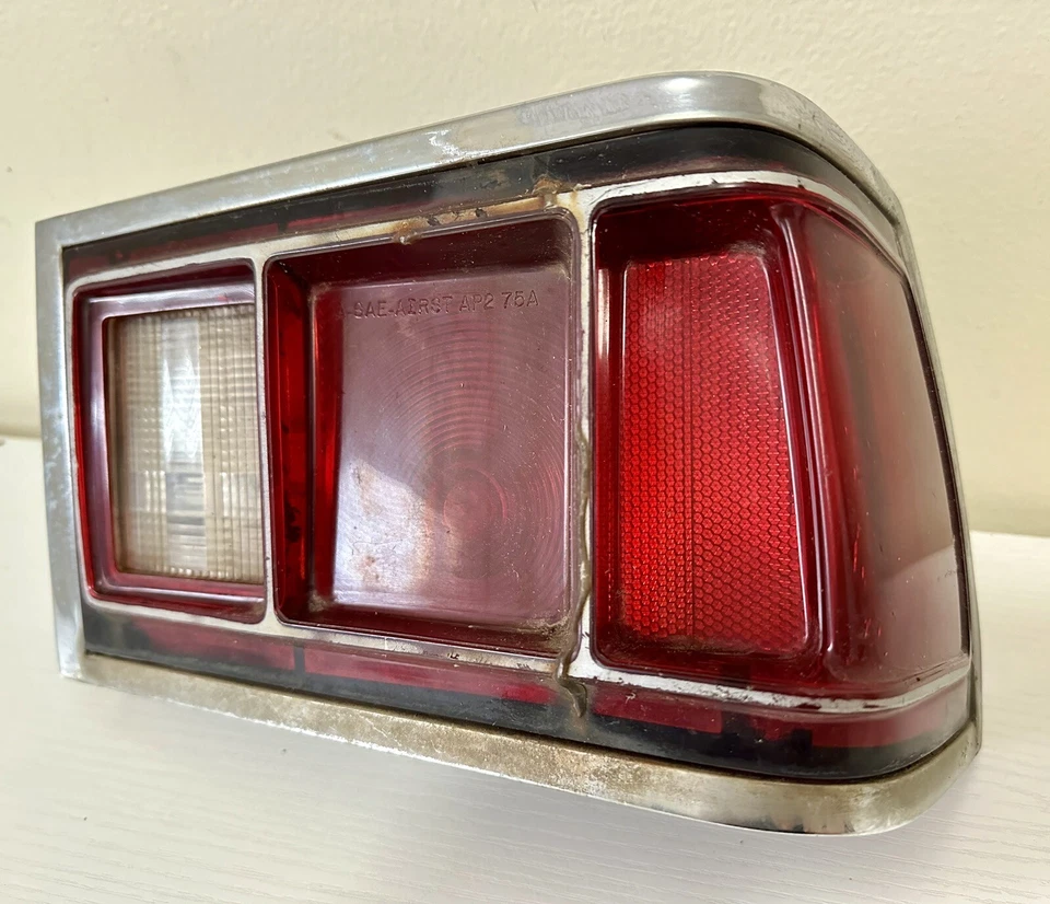 1974-1977 AMC Hornet Right Side Rear Tail Light Lens & Bezel Assembly OEM - Image 1 of 4