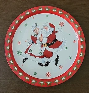 2 Christmas Tin Platters Ribbon & Greenery Mr & Mrs Claus Dancing - Picture 1 of 8