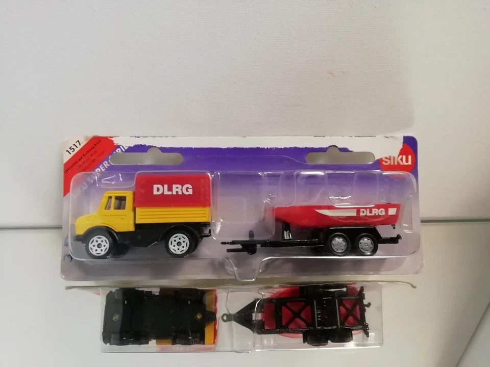 Siku 1517 Unimog con barca a motore DLRG in blister - Immagine 1 di 4