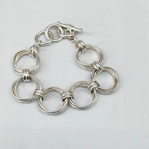 Sterling Silver Rolling Band Rings Link Bracelet 57.8 Grams - Picture 1 of 6