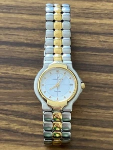 Montre universelle Geneve Polerouter Geneve occasion quartz suisse vintage du Japon - Photo 1/10