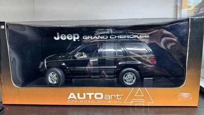 AUTOart Jeep Grand Cherokee Black 1/18 Scale Model 74012 - Image 1 of 4