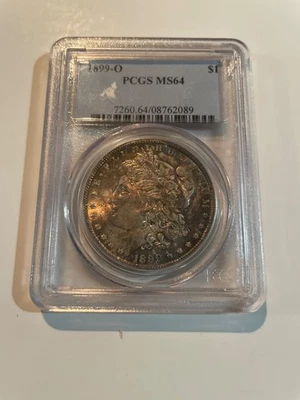 1899 o morgan silver dollar ms64 with toning - Image 1 of 4