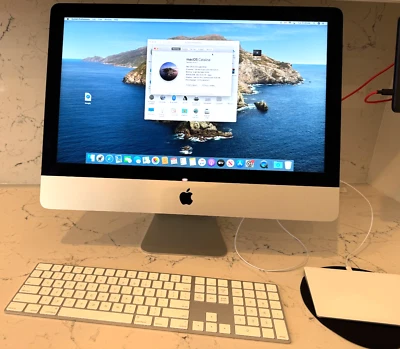 Apple iMac 21.5" Desktop Computer 2015 with Original Keyboard and Mouse Pad - Image 1 of 4