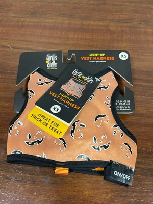 Chaleco Arnés Thrills & Chills Iluminado Naranja y Negro Calabazas XS Foto 1 de 2