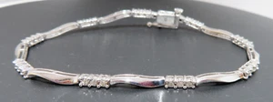10K WG LADIES DIAMOND TENNIS BRACELET 0.30 tcw 7" LONG  6.36 grams (G133502) - Picture 1 of 9