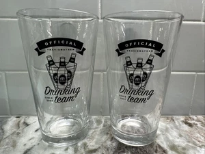 Travis Mathew Official Drinking Team - Pair of Pint Glasses, RARE PO-LN - Picture 1 of 5