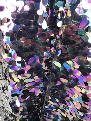 BLACK-PURPLE IRIDESCENT 18MM TEARDROP-MERMAID SEQUINS ON A BLACK MESH-SOLD YARD - Image 1 of 4