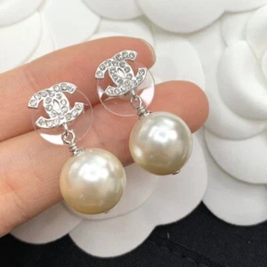 Chanel CC Pearl Earrings - Picture 1 of 6