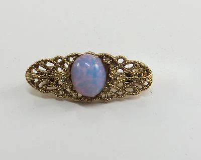 Broche prendedor nupcial vintage 1928 Company confeti opalescente lucita en tono dorado Foto 1 de 3