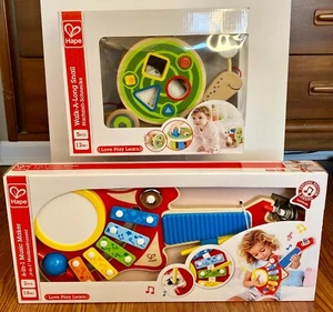 HAPE Baby/Kleinkind Holz 2-Spielzeug Geschenkset Posten Walk-A-Long Schnecke & 6-in-1 Musikmacher - Bild 1 von 9