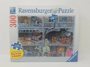 Rompecabezas Ravensburger Camera Evolution 300 pieza de gran formato - Imagen 1 de 8