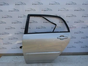 TOYOTA COROLLA 5DR 2002-2007 DOOR BARE (REAR PASSENGER SIDE) IN SILVER -XBDR0088 - Picture 1 of 2