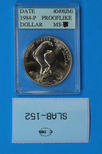 1984-P $1 SILVER DOLLAR OLYMPICS ACCUGRADE MS PROOF LIKE PL HN-152 - Picture 1 of 2