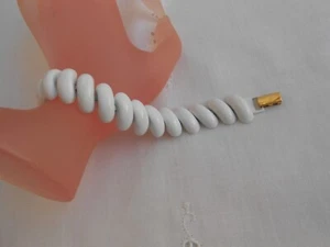 Bracciale firma NAPIER PAT. 4.774.743 laccatura bianca chiusura metallo dorato - Foto 1 di 9