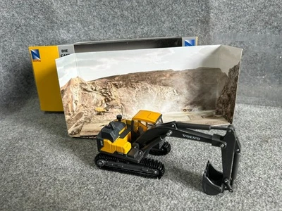 VOLVO EC140E ESCAVATORE CINGOLATO CM 14 scala 1:55 NEW RAY modellino METALLO - Immagine 1 di 4