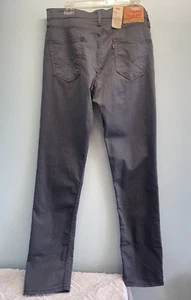 Pantalones de mezclilla Levi’s 511 ajustados elásticos para hombre 34x34 5 bolsillos grises se sienta debajo de la cintura - Imagen 1 de 16