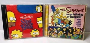 THE SIMPSONS: SING THE BLUES & SONGS IN THE KEY OF SPRINGFIELD CDs 1990 1997 - Foto 1 di 19