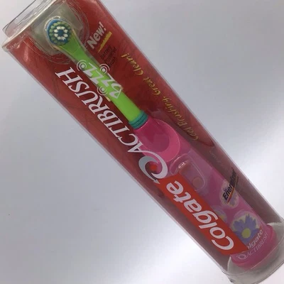 Vintage COLGATE ACTIBRUSH Children’s Battery Powered Toothbrush Pink/Green New - Image 1 of 4