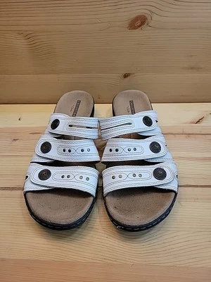 Женские сандалии Clarks модель Leisa Grace с белым кожаным ремешком шлепанцы обувь 7 - Изображение 1 из 4