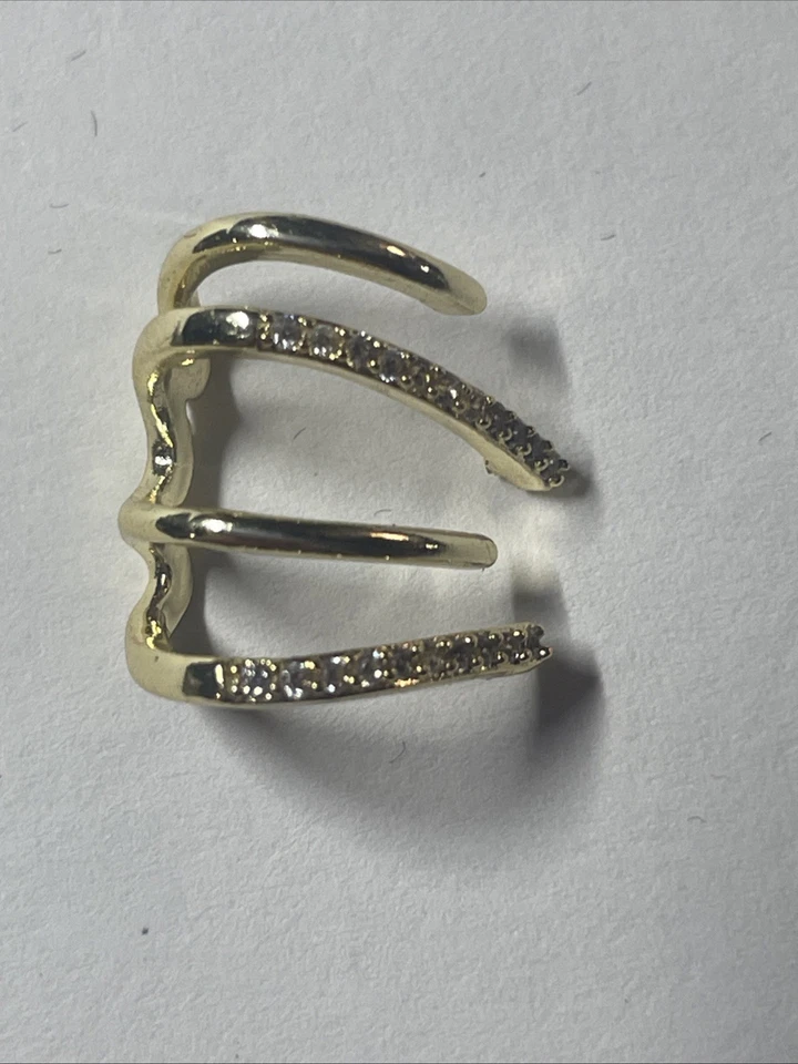 Brazalete pendiente de marcaita de cristal estilo metal y pavé tono dorado Foto 1 de 1